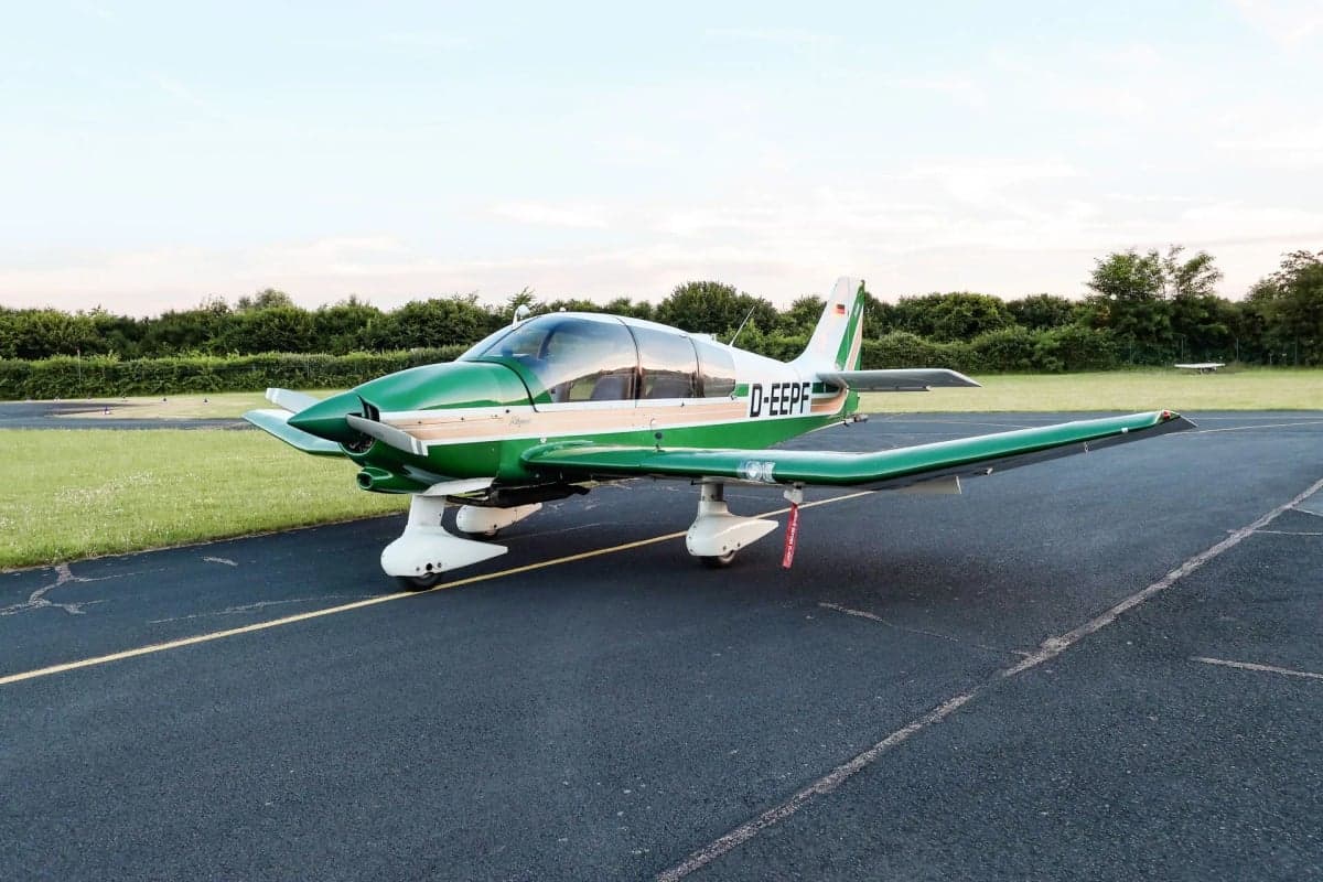 Rear quarter view of the Robin D-EEPF aircraft on the tarmac.