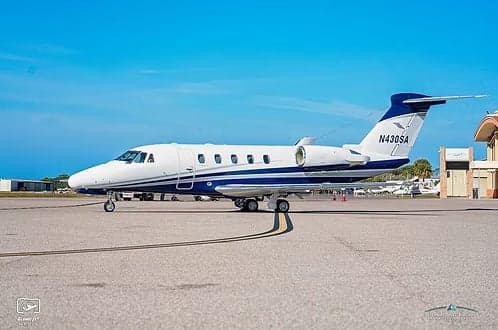 A Cessna Citation CJ3+ aircraft with registration N430SA parked on the tarmac.