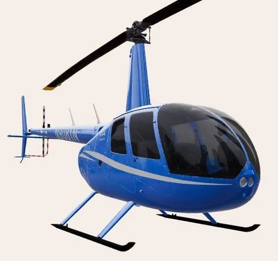 A blue Robinson R44 helicopter with registration N9081N, viewed from the front-right side.