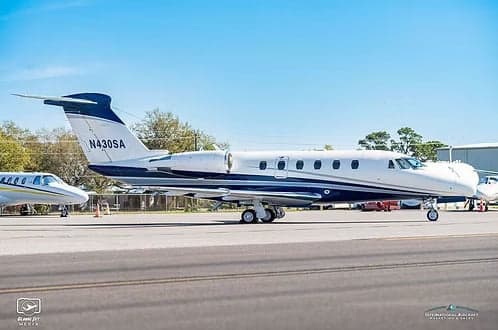 A Cessna Citation CJ3+ aircraft with registration N430SA parked on the tarmac.