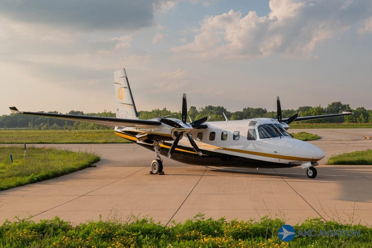 A Twin Commander aircraft on the tarmac.