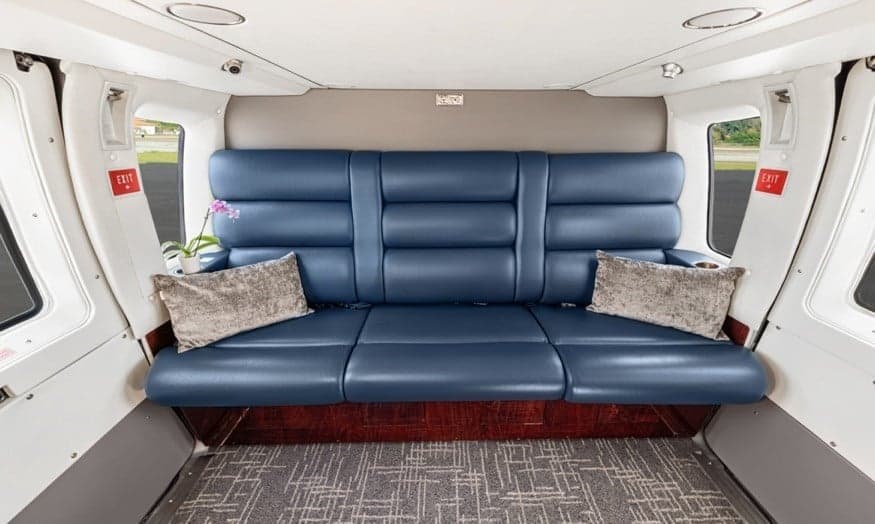 View of the interior cabin with blue leather seats.