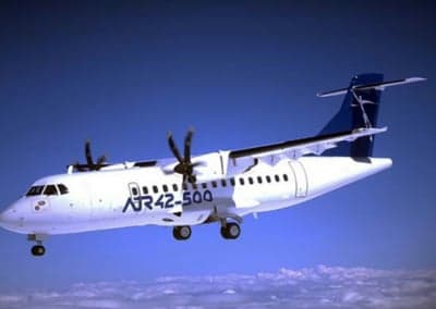 Front view of a white ATR 42-500 aircraft reflected in water.