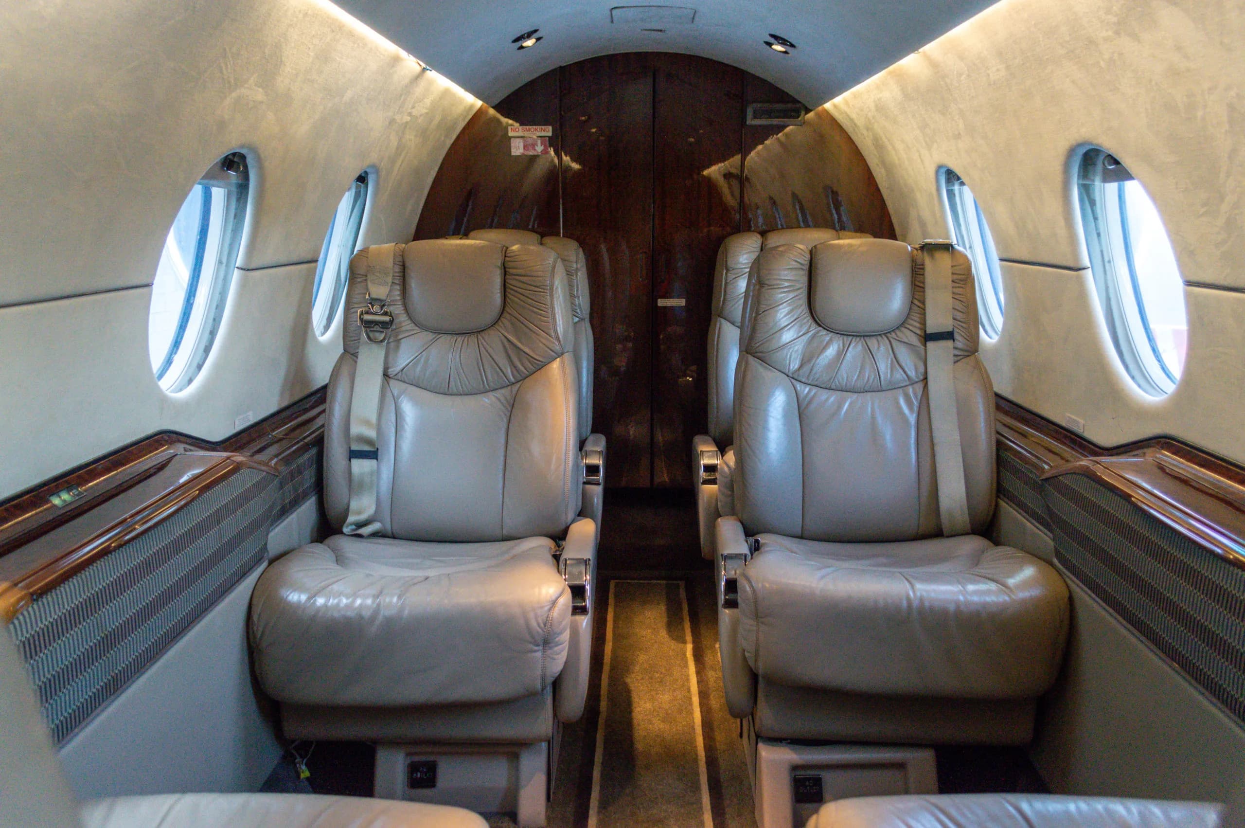 Interior view of the Learjet cabin showing the leather seats.
