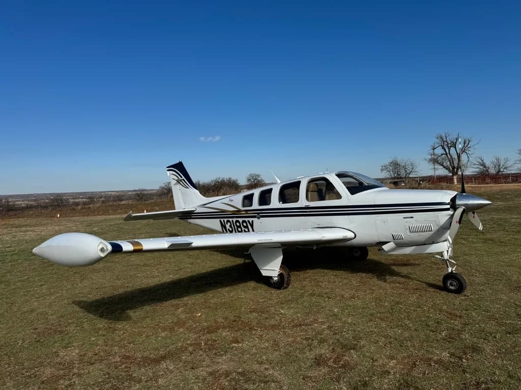 N3189Y Beechcraft Bonanza on the ground with a white and blue paint scheme.