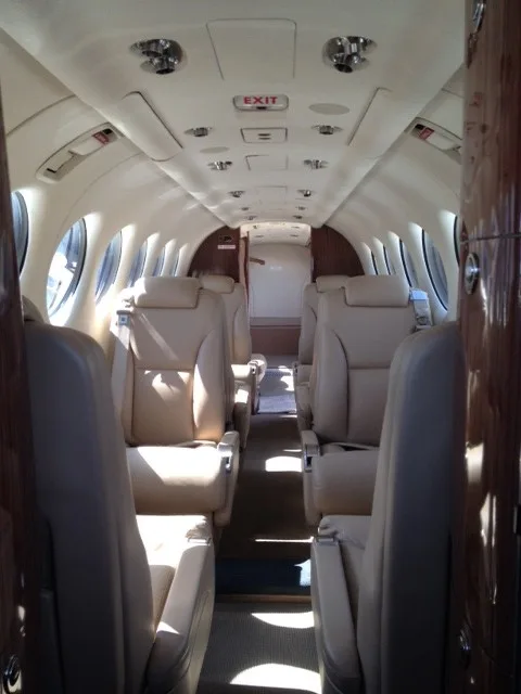 View of the interior cabin seats of the Beechcraft King Air 350i.