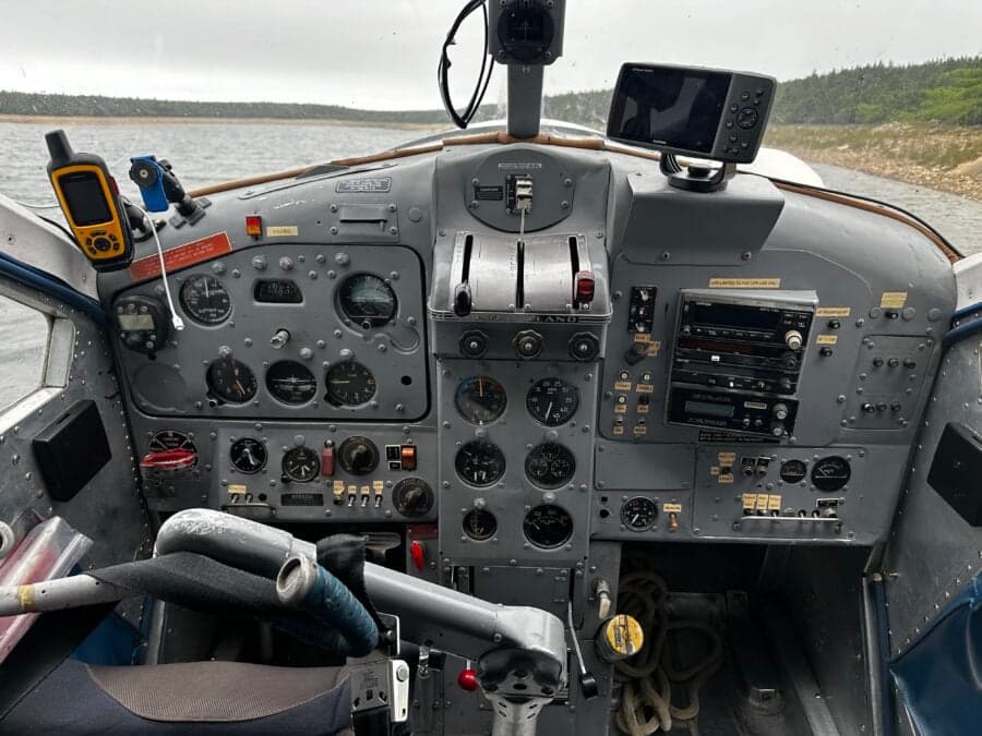 The cockpit of the de Havilland Beaver shows the instrument panel and controls.