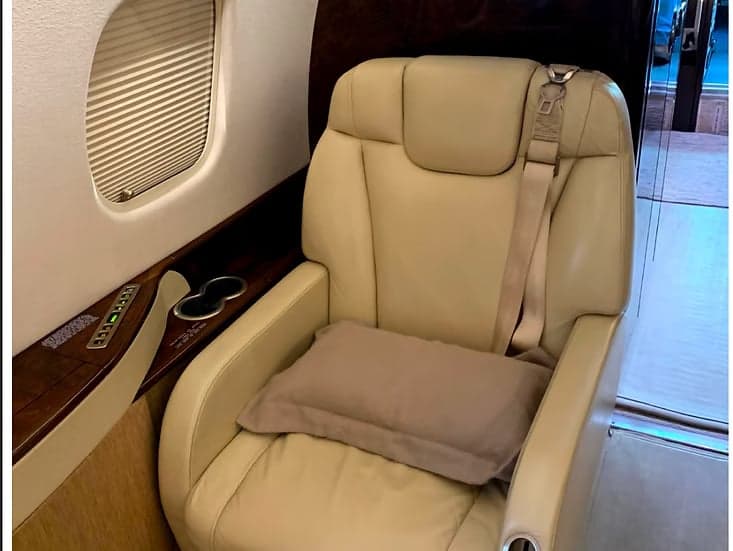 Close up of a leather seat inside the aircraft.