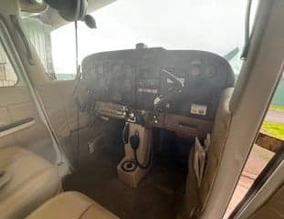 Cockpit view of a Cessna 172 with instrument panel.