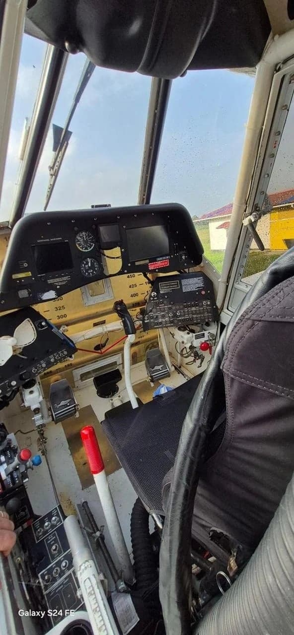 The cockpit of a Thrush 510G aircraft, showing the instrument panel, controls, and pilot's seat.