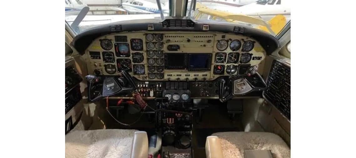 View of the aircraft cockpit showing the instrument panel.