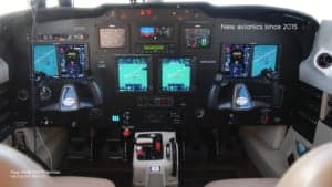 Aircraft cockpit with modern avionics.