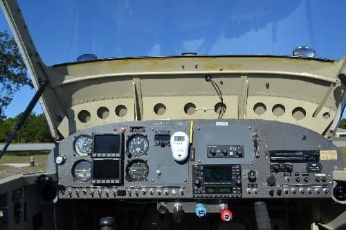The instrument panel of an aircraft cockpit is shown.
