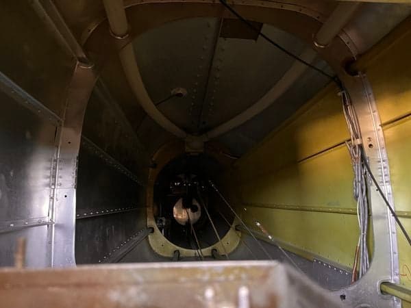 Internal view of the aircraft's tail section.