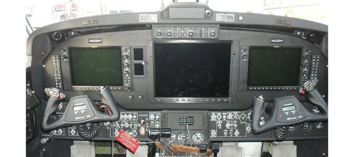 The cockpit of the Beechcraft King Air 350 features a modern glass panel display.