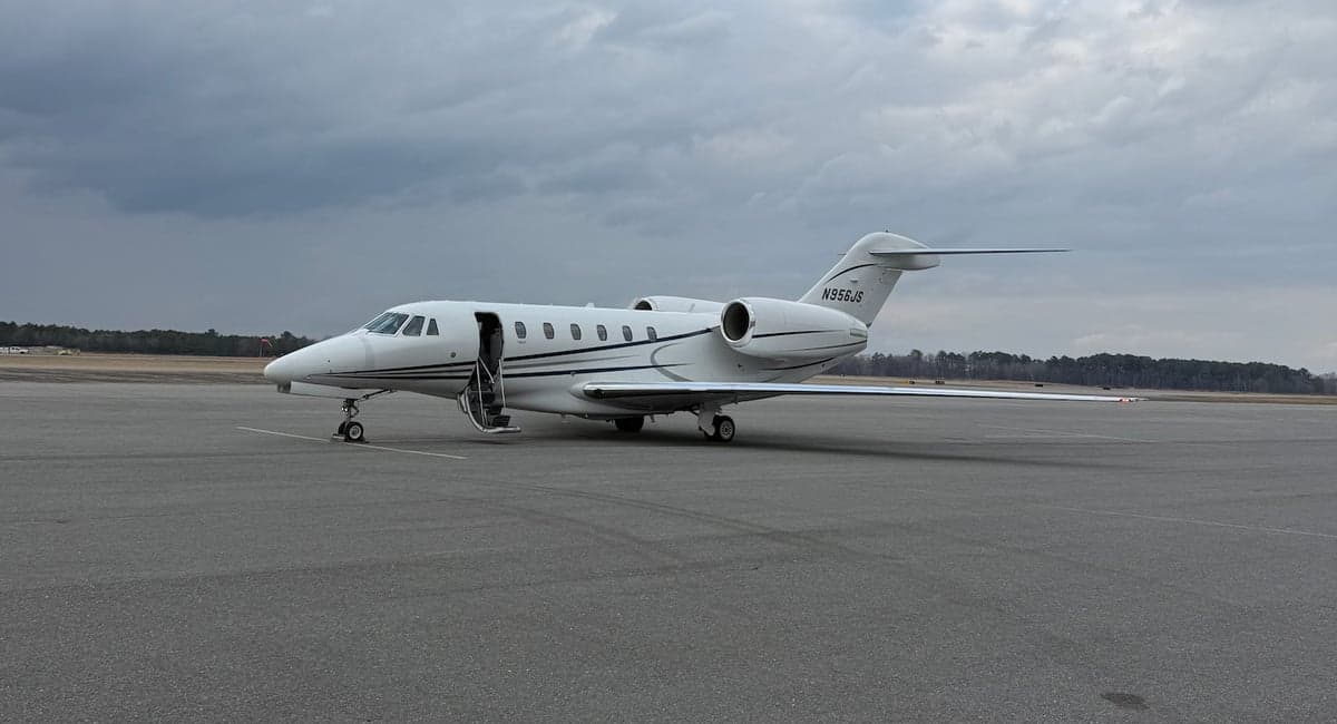 Citation jet with white paint scheme on the tarmac.