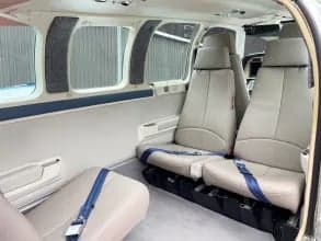 Interior view of the aircraft cabin with seats.