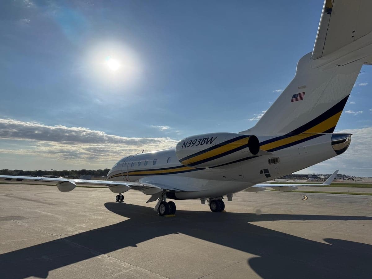 Rear view of the aircraft N393BW on the tarmac.