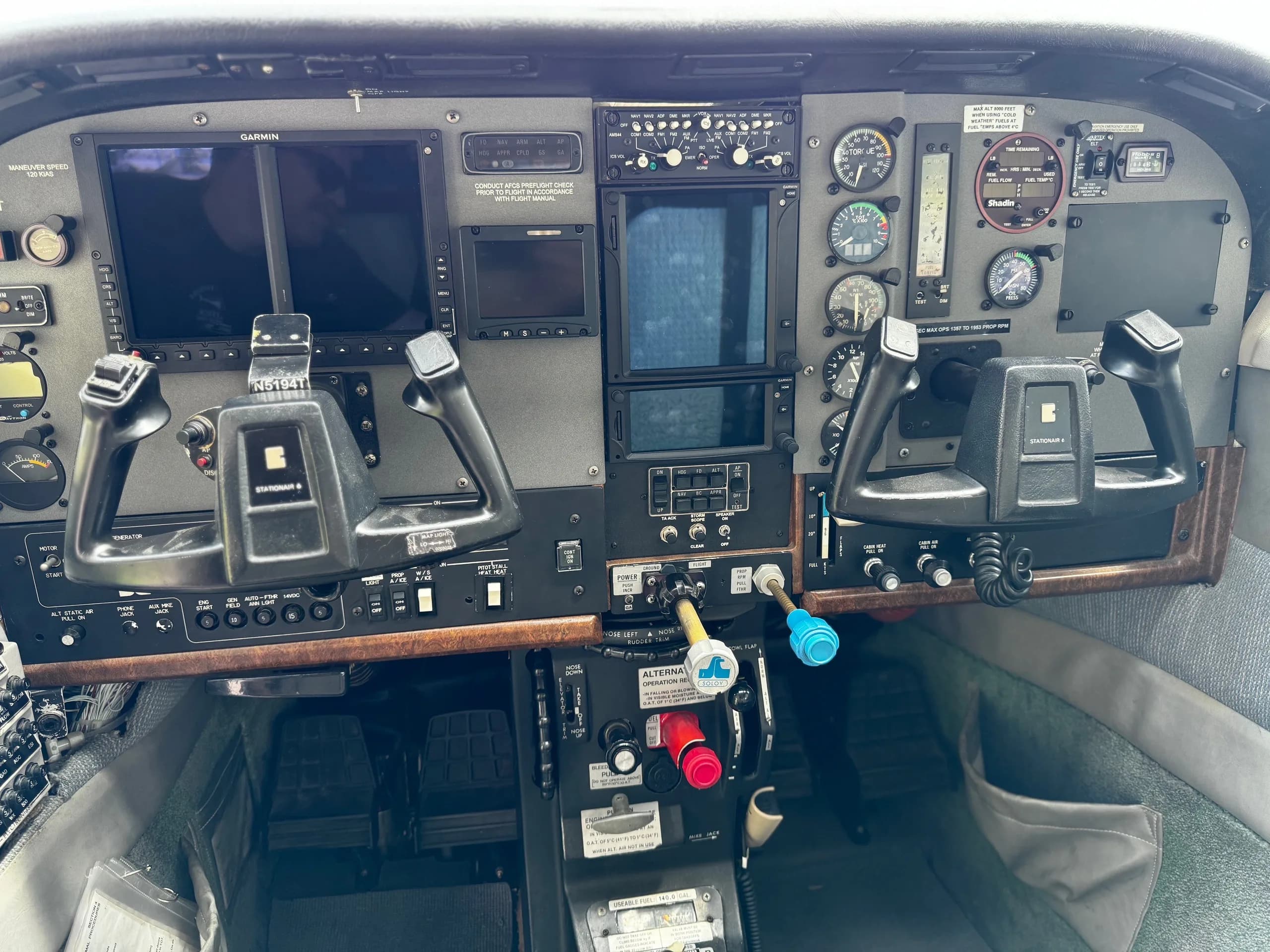 Instrument panel of the Cessna 206 Turbo Stationair with various gauges and controls.
