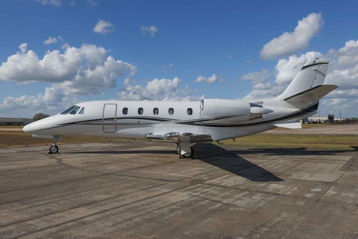 A Citation CJ3 aircraft is parked on the tarmac.