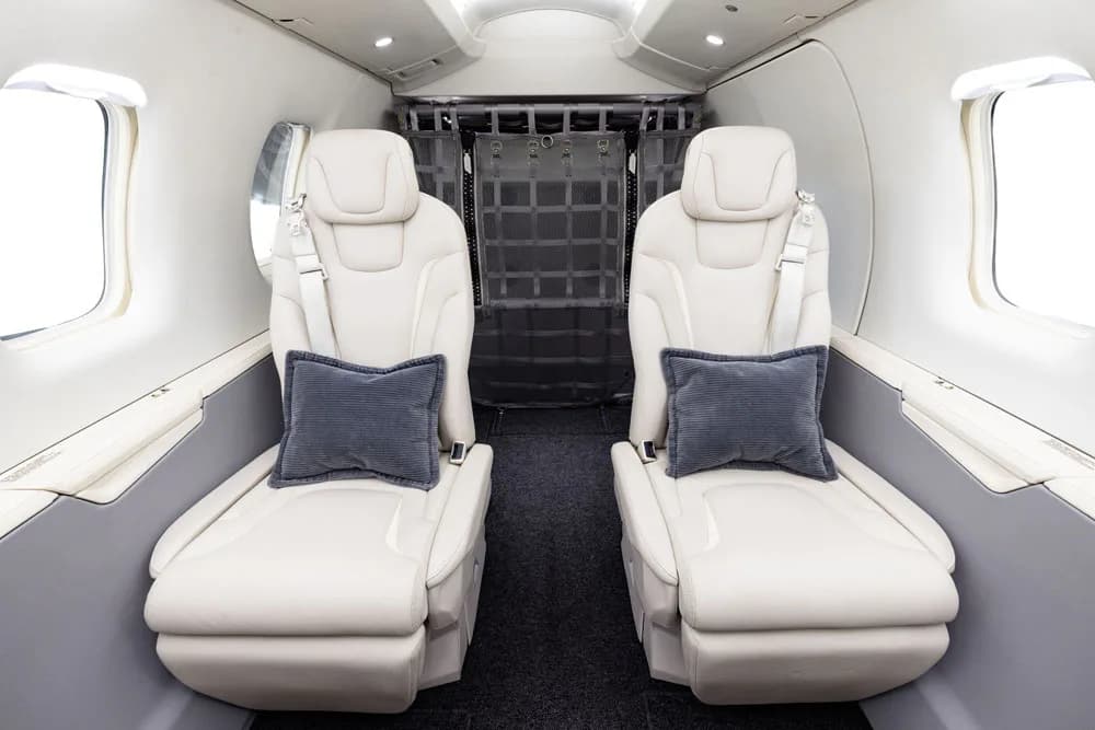 Close up of the aircraft's white leather seats.