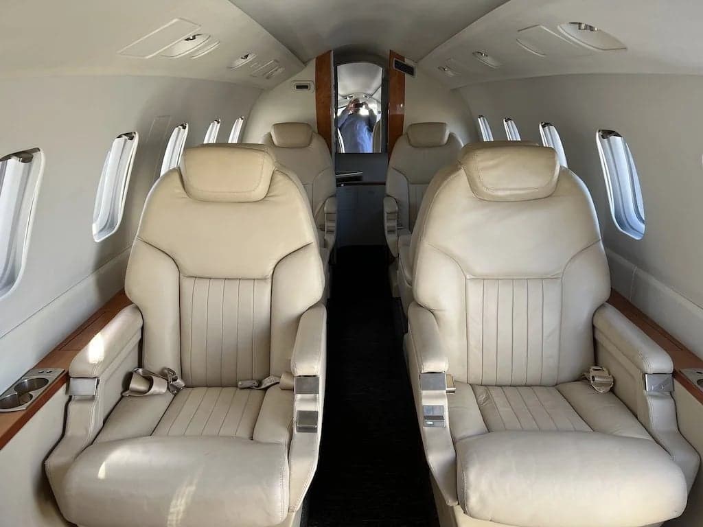 The interior of the Piaggio Avanti EVO features comfortable leather seats and a spacious cabin.