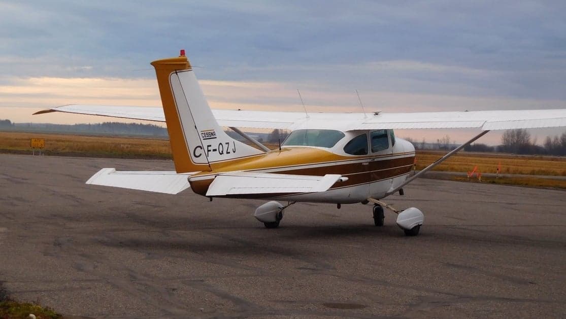 Cessna 182 Skylane parked on the tarmac.
