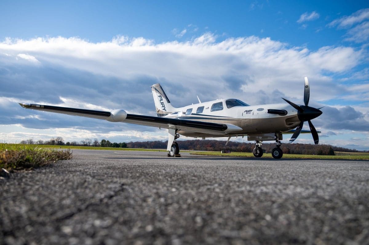 A low angle view of the Fury M700 aircraft on the tarmac.