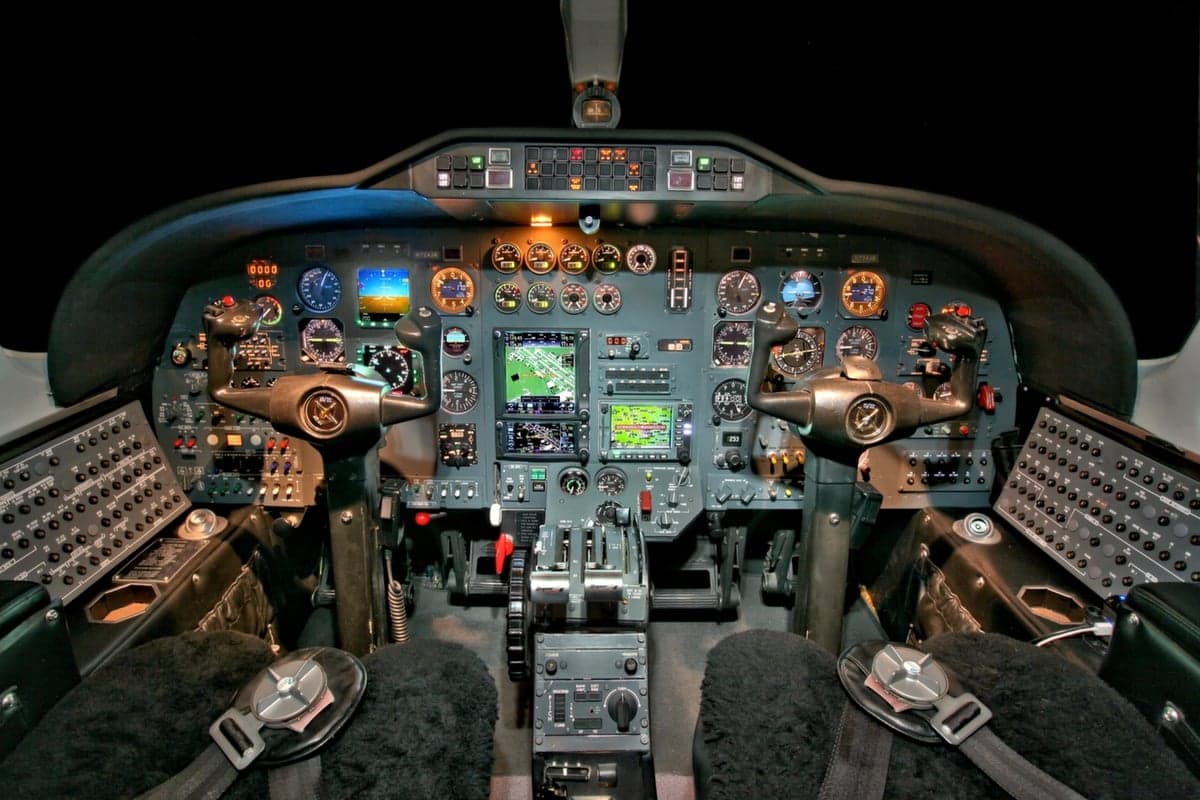 The cockpit of the Cessna Citation CJ1+ features a full instrument panel and dual control yokes.