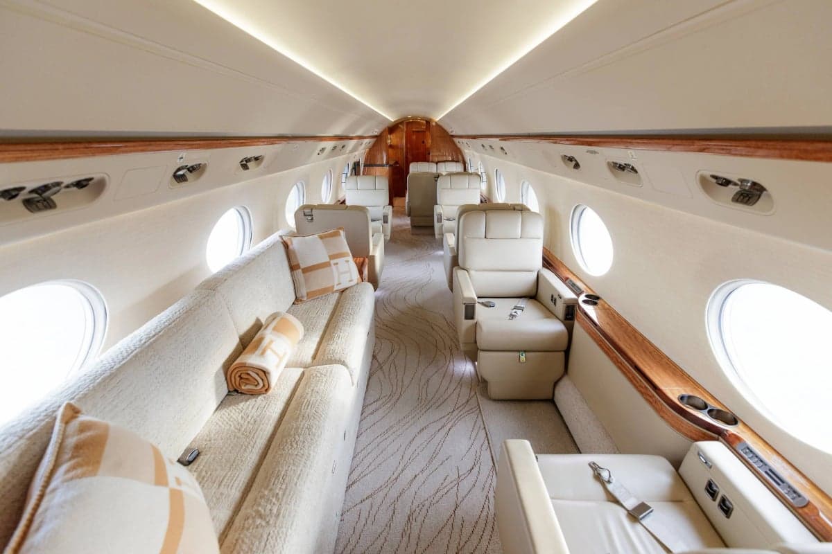 A view of the Gulfstream G550 cabin showing the seating arrangement and interior design.