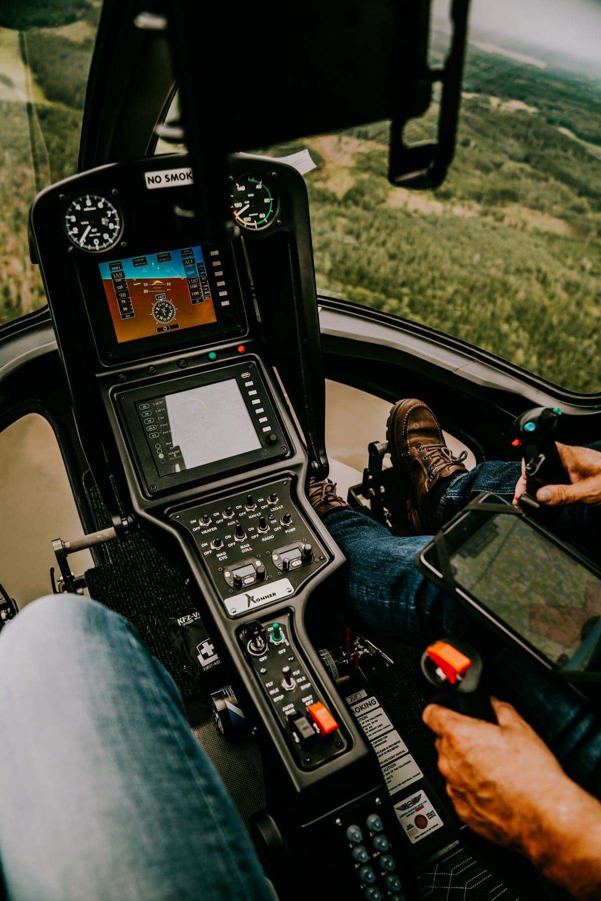 View of the helicopter cockpit in flight.