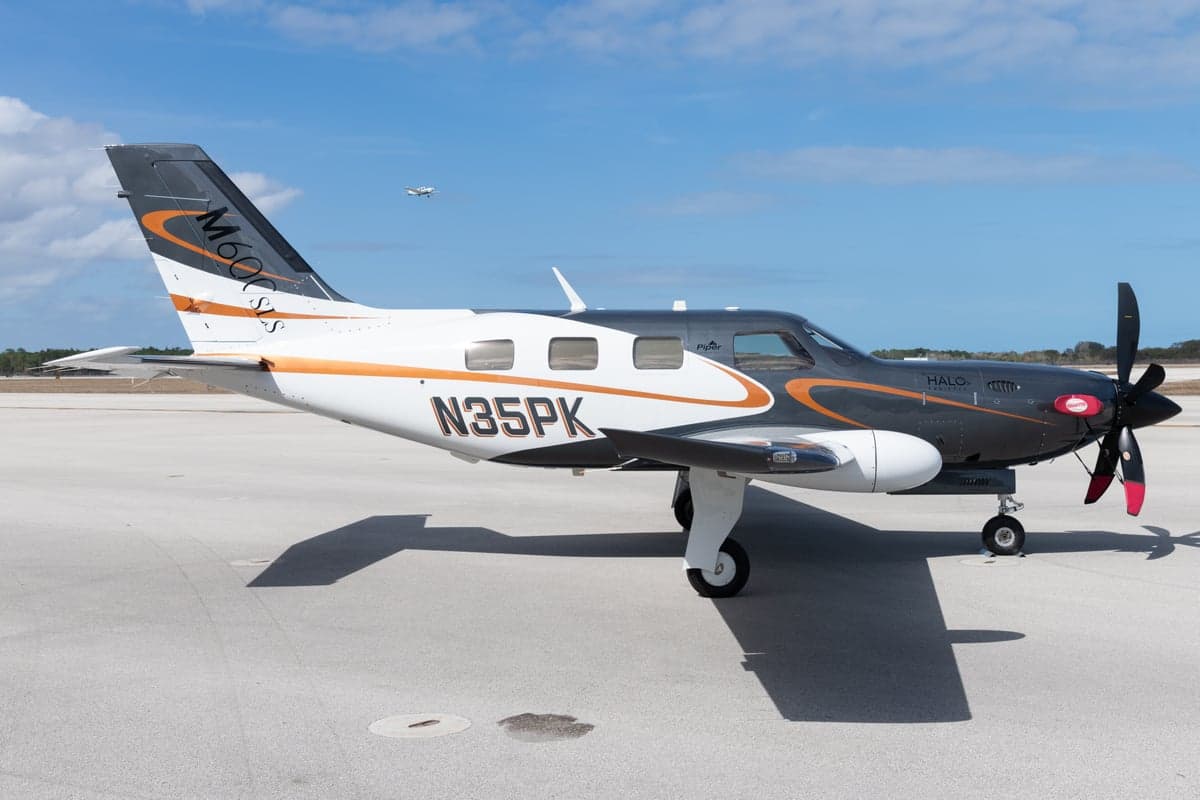 A Piper M600 HALO, registration N35PK, is parked on the tarmac.