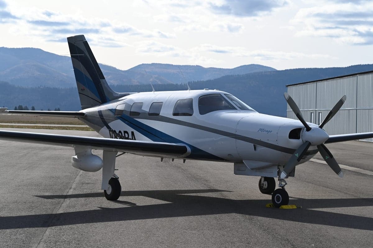 Piper Mirage aircraft N98RA parked on the tarmac.