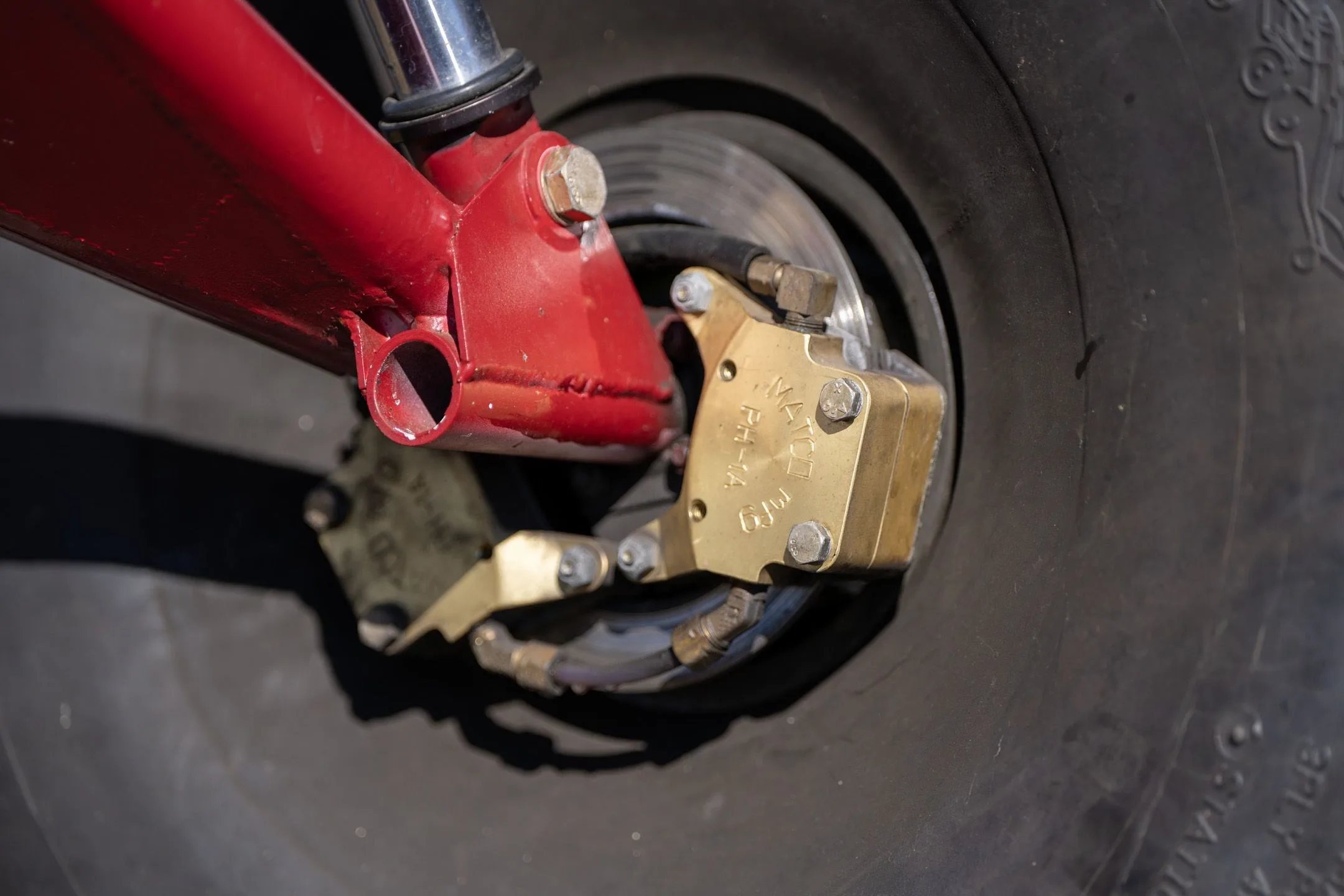 Close-up of the brake caliper and large tundra tire on a Just Aircraft SuperSTOL.