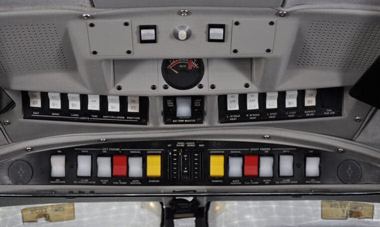 Overhead view of the cockpit switches and controls.