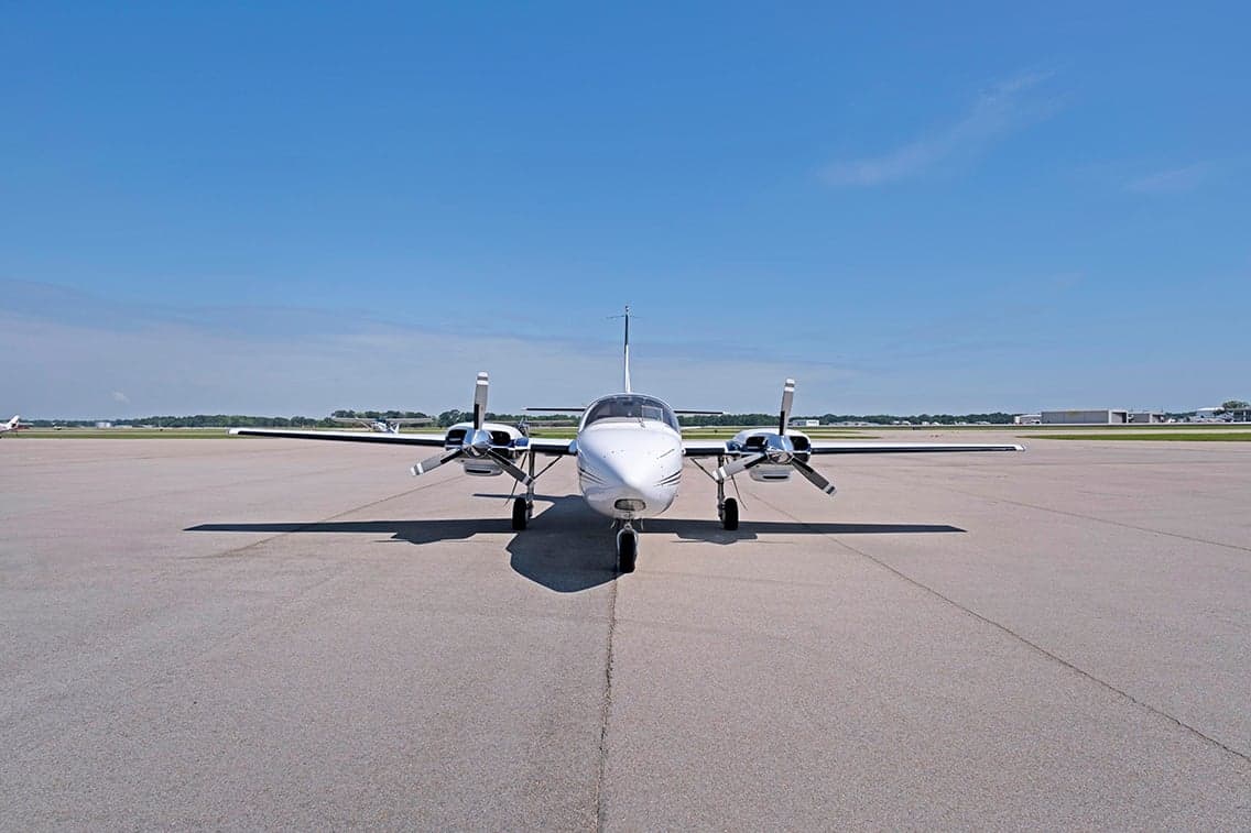 Front view of Aerostar aircraft N419BC parked on the tarmac.