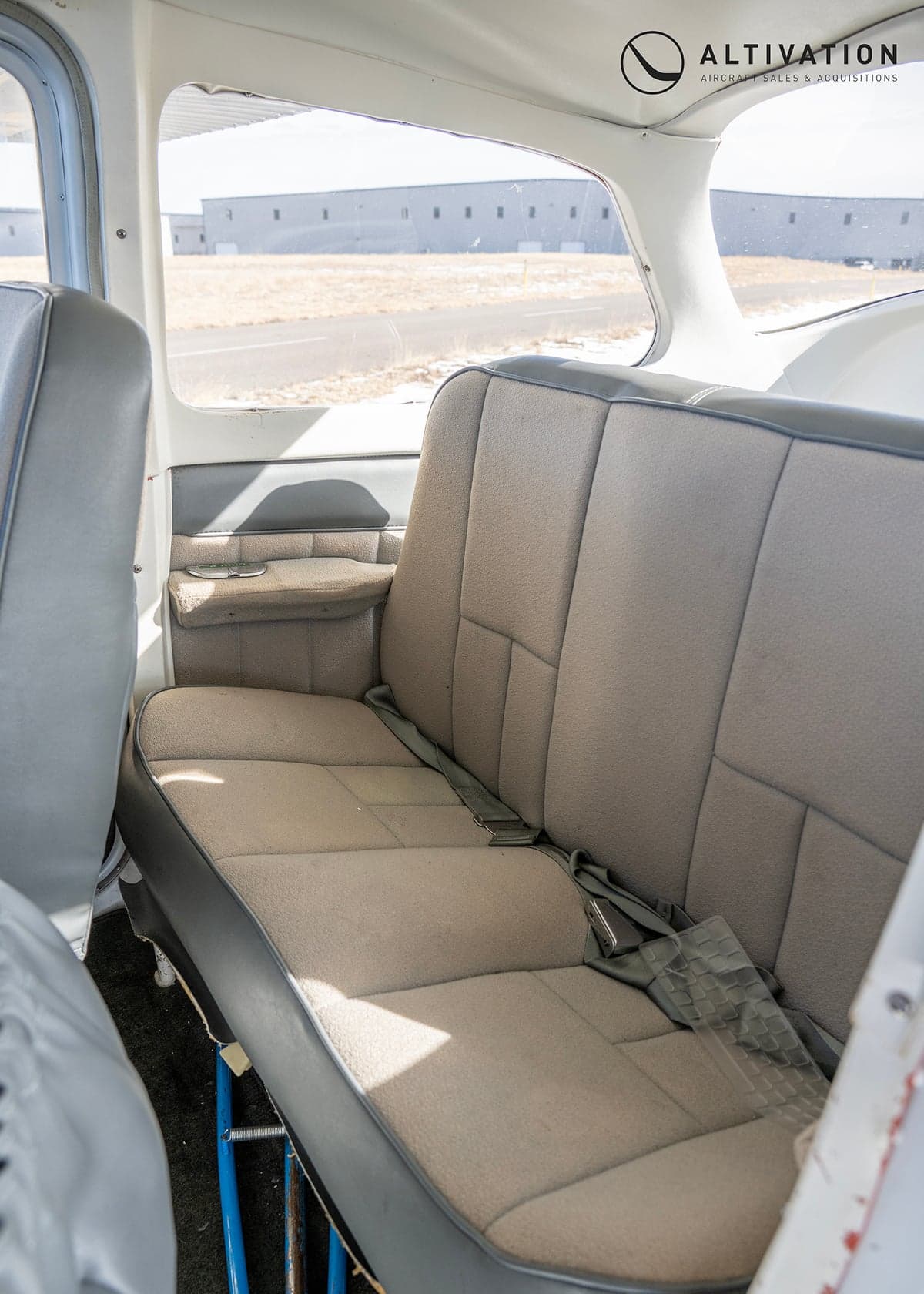 View of the Cessna 172 Skyhawk cockpit and front seats.