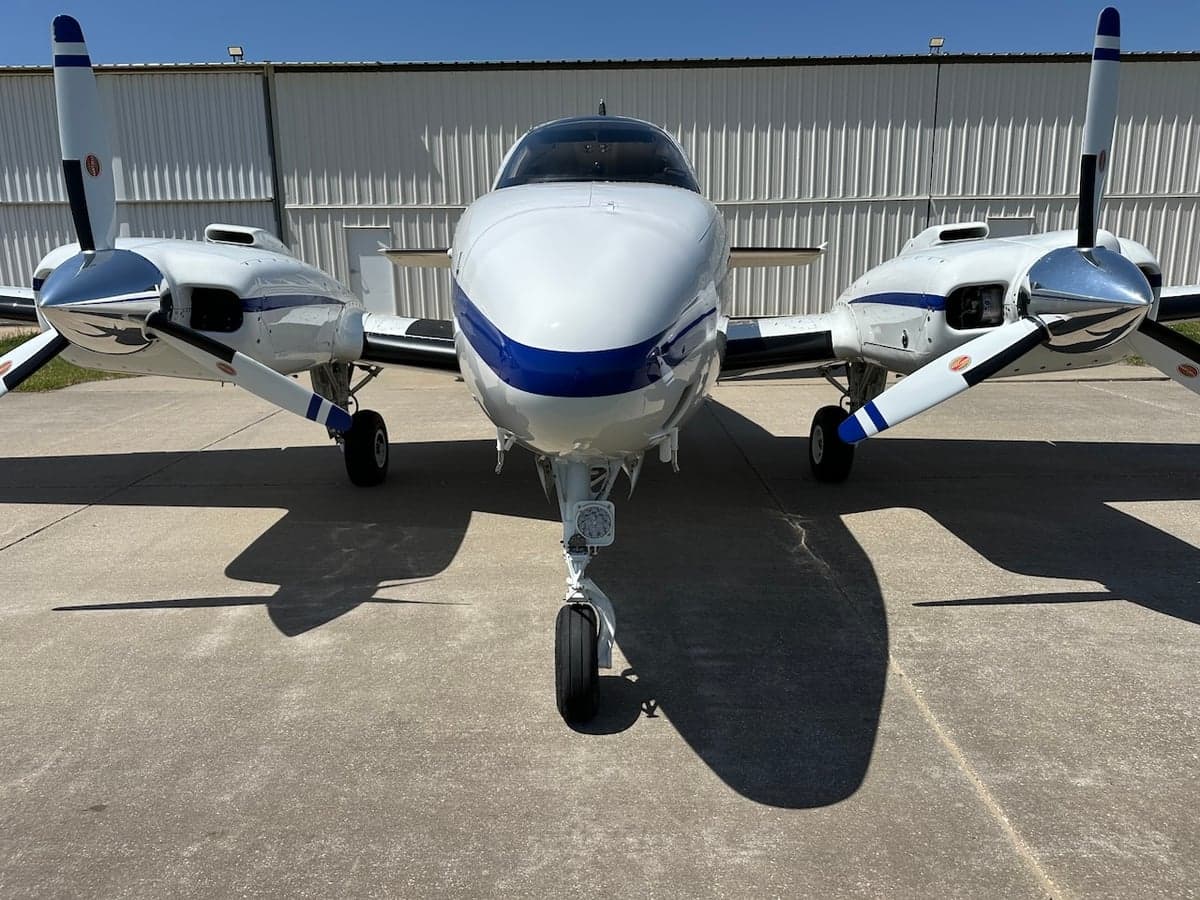 Front view of the Beechcraft Baron N51FD, showcasing its twin engines.