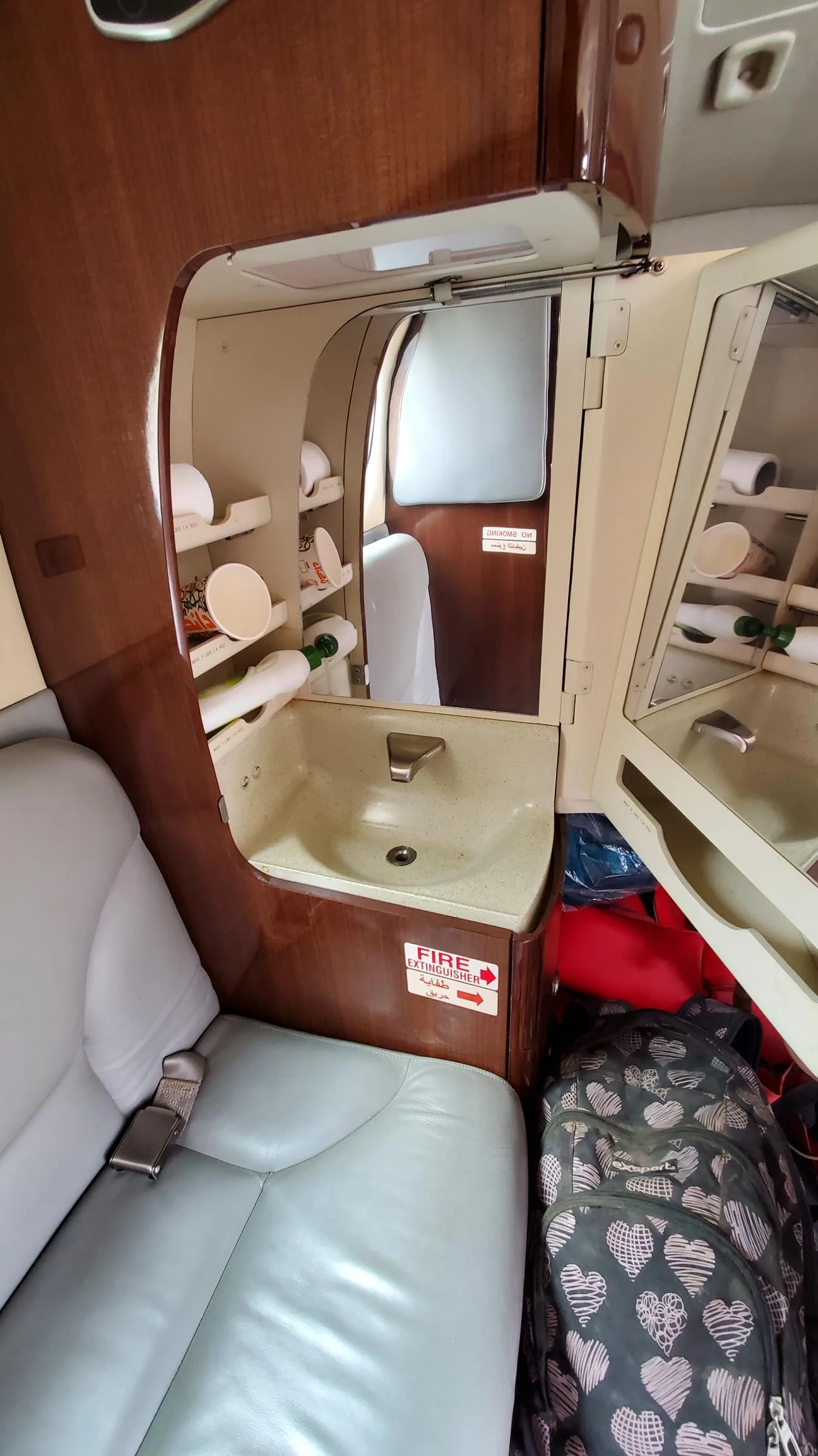 View of the aircraft's lavatory and storage area.