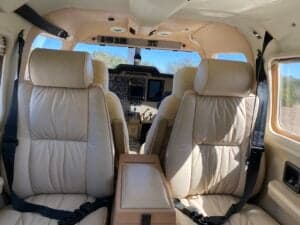 View of the cockpit from the rear seats of the aircraft.