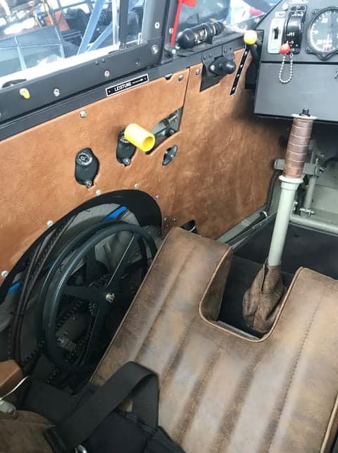 Close-up of the aircraft cockpit controls and seat.