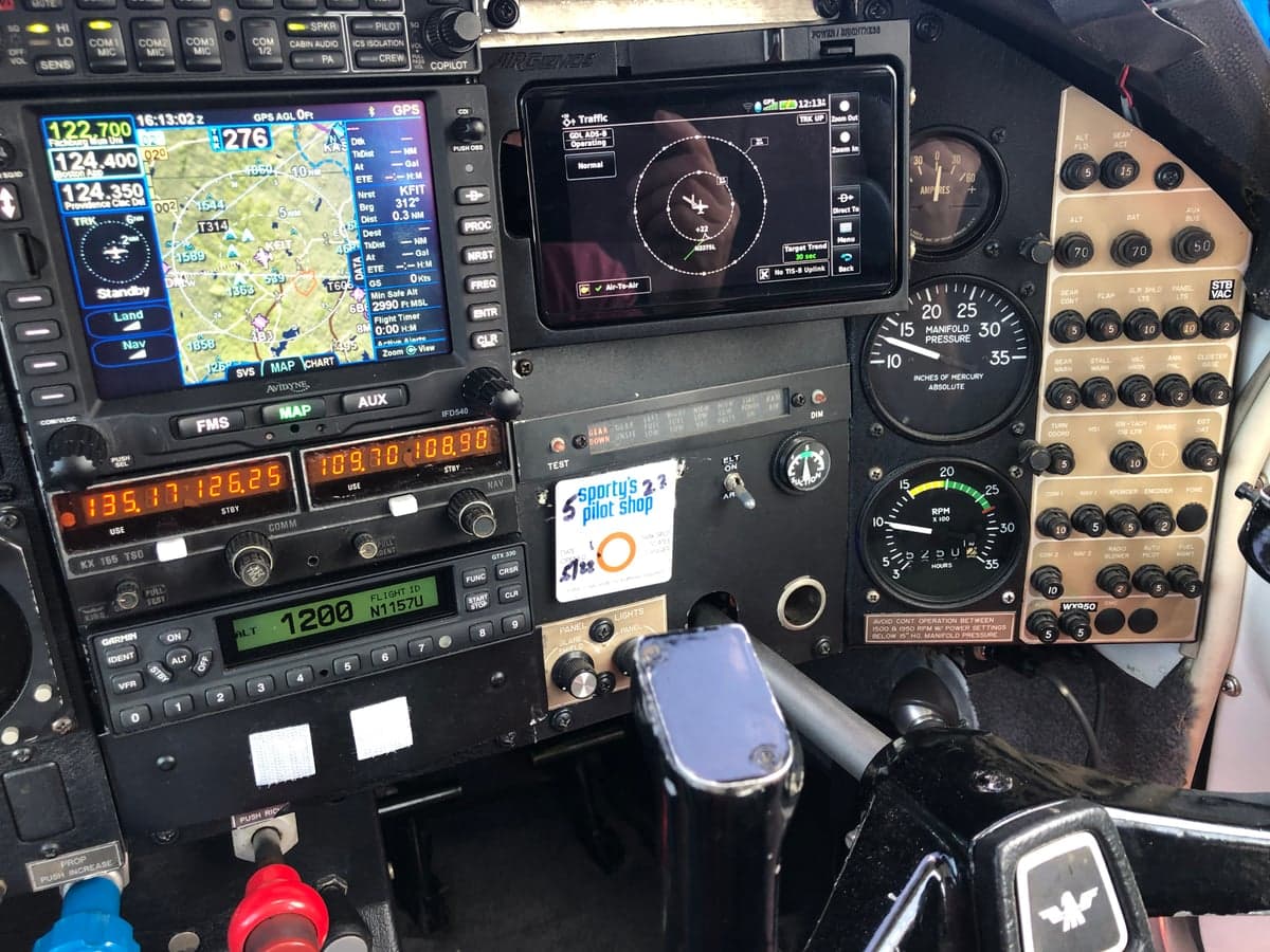 Close-up of the aircraft's cockpit instrument panel and avionics.