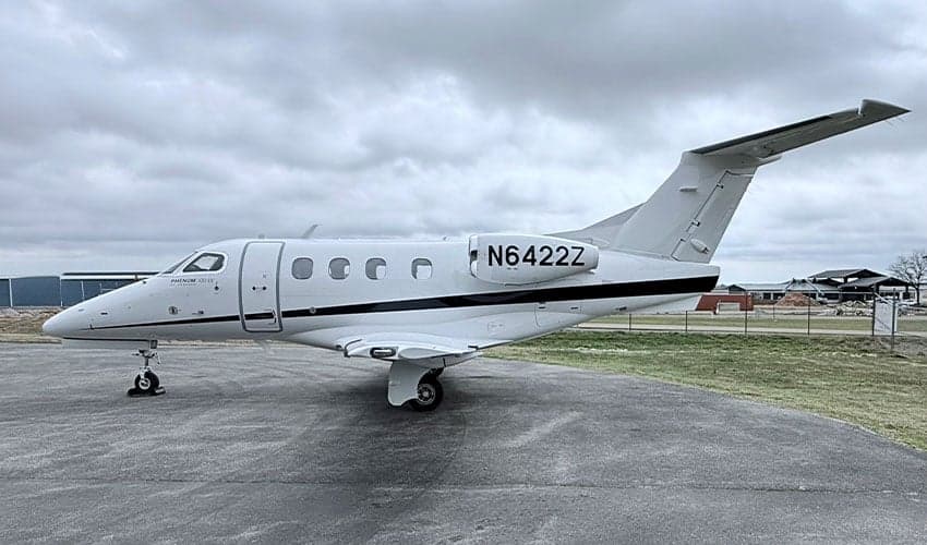 Side view of N6422Z Phenom 300E on the ramp.