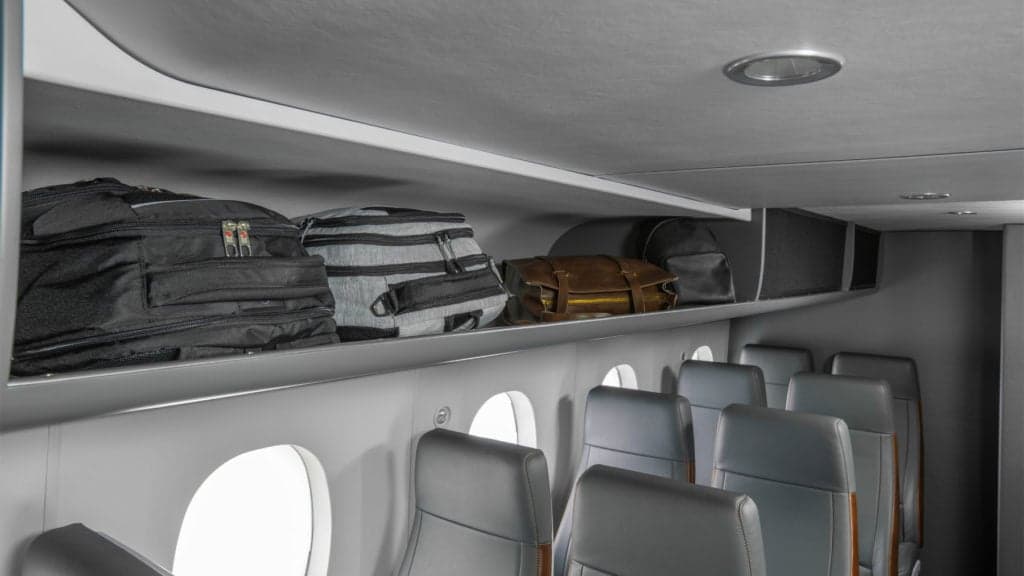 Interior view of the Cessna Skycourier cabin with overhead storage.