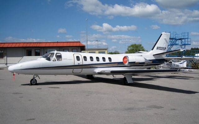 A Cessna Citation CJ1 parked on the tarmac.