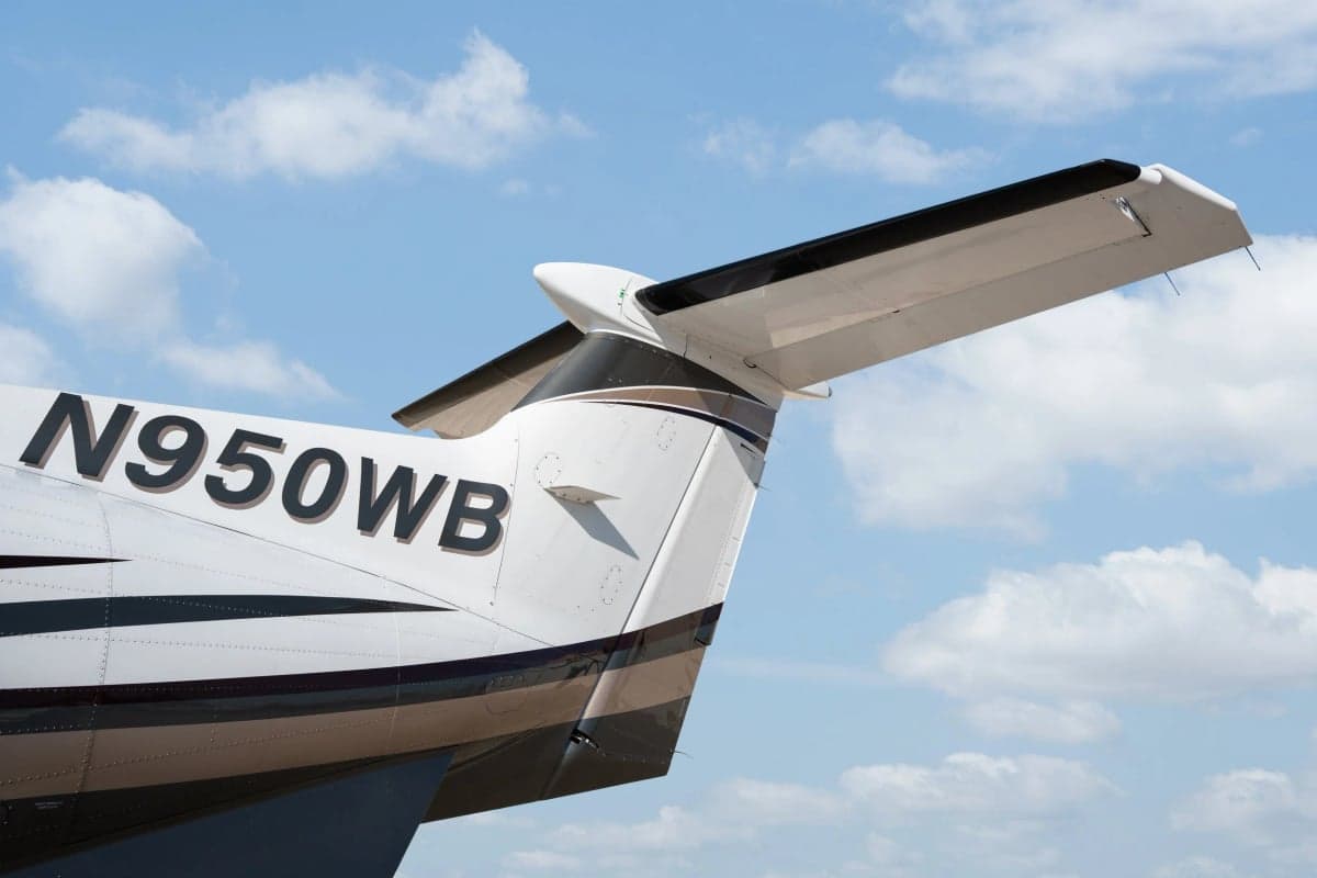 Tail section of a Pilatus PC-12NGX with registration N950WB.