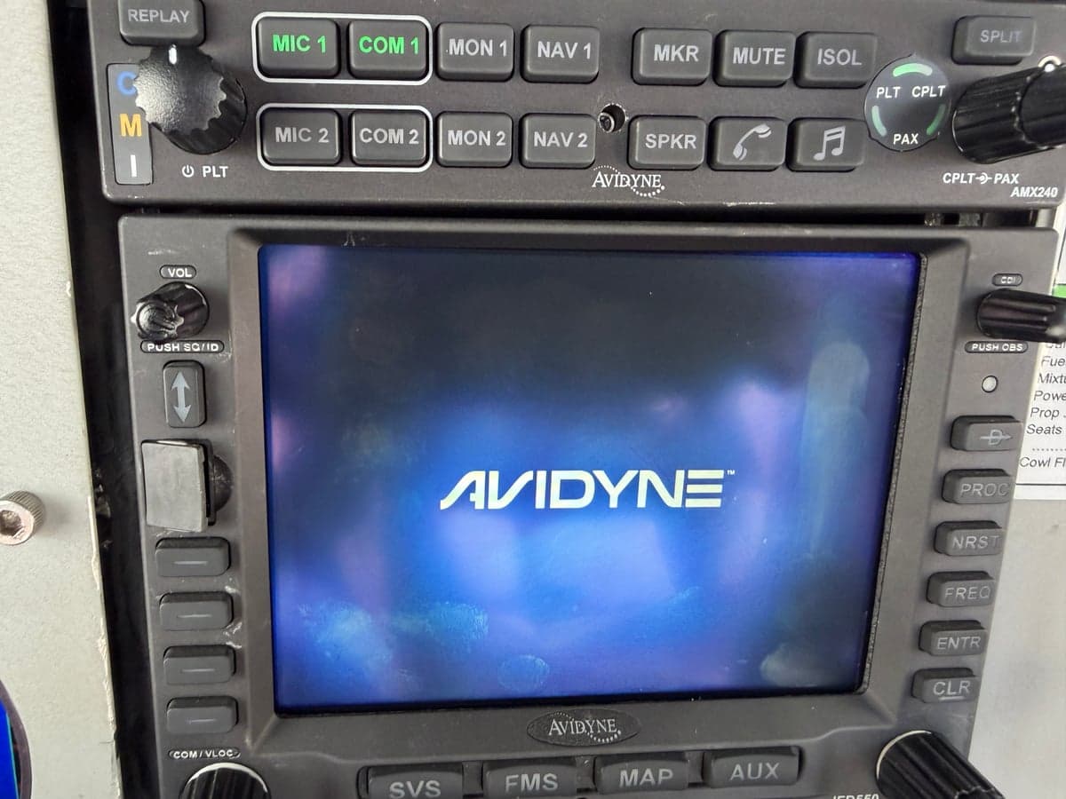 Close-up of the Avidyne AMX240 and IFD550 avionics in the N8268M aircraft's cockpit.