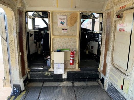 View of the aircraft's interior, looking towards the cockpit.
