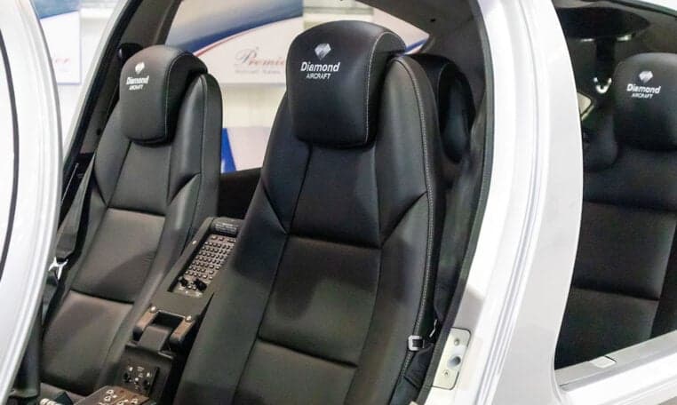 Interior view of the Diamond DA62 showing the black leather seats.