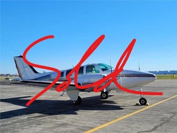 A Beechcraft Baron on the ramp with a SOLD overlay.